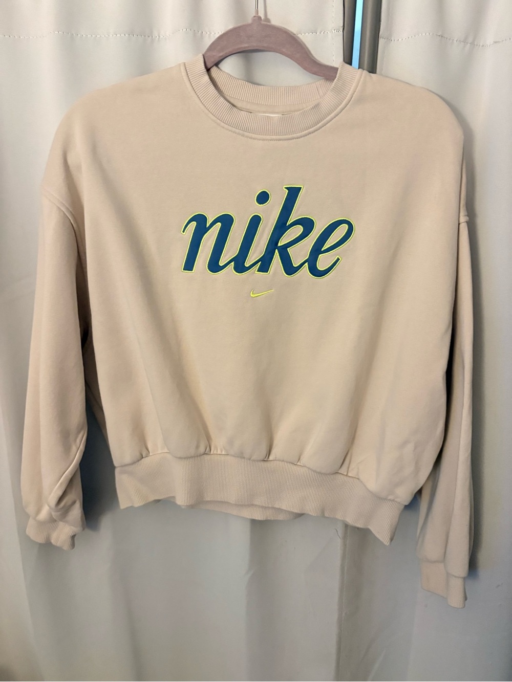 Nike Youth Cream Crewneck Sweatshirt with Blue Script Logo